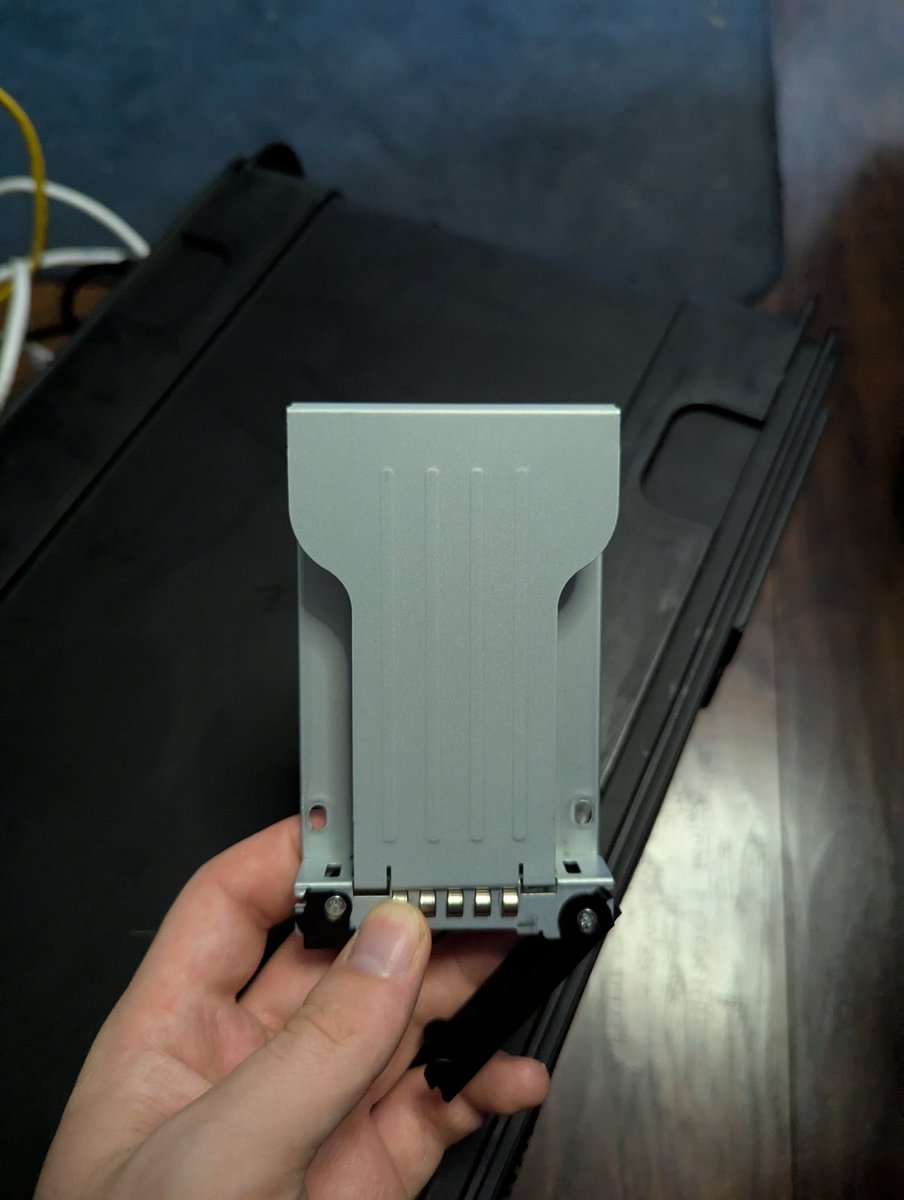 RossComputerGuy's tweet image. Who can identify the form factor for this drive caddy?