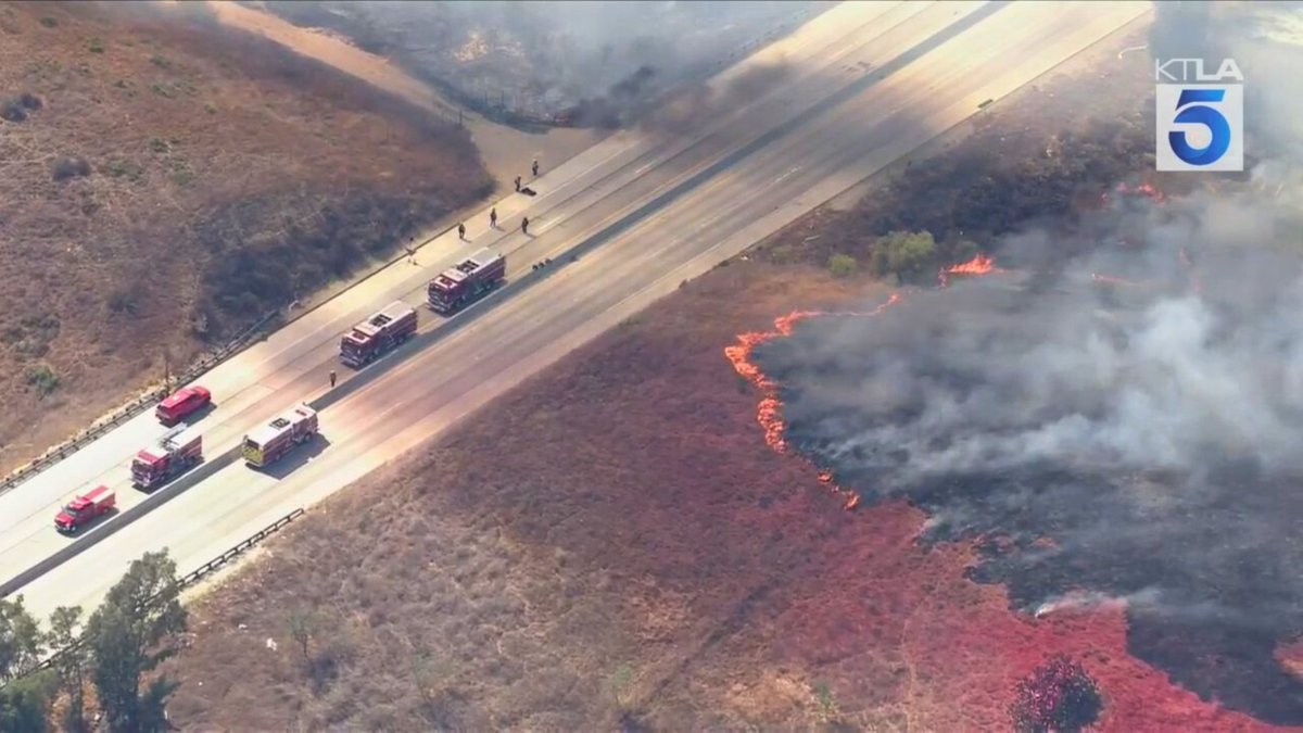 KTLA's tweet image. #DEVELOPING: The #EuclidFire has grown to 150 acres and jumped Highway 71. Live updates: ktla.com/news/local-new…