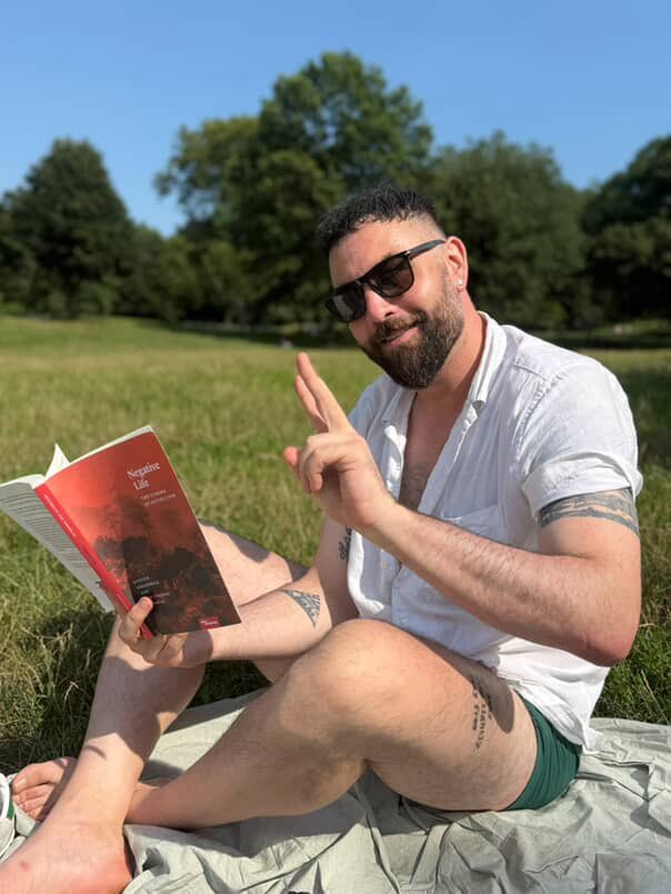 me enjoying a devastating takedown of contemporary eco-criticism, NEGATIVE LIFE: THE CINEMA OF EXTINCTION, written by my friends Steven and Jean-Thomas hehehehe