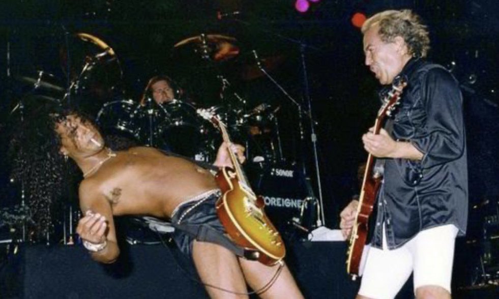 “This photo was taken around 1999 in Phoenix Arizona, where Slash and I played together on stage. We had a ball. We’d met at a hotel in LA and spent the afternoon relaxing by the pool, chatting and drinking.” - Mick Jones

Happy 60th to rock ‘n’ roll’s guitar legend, @slash!