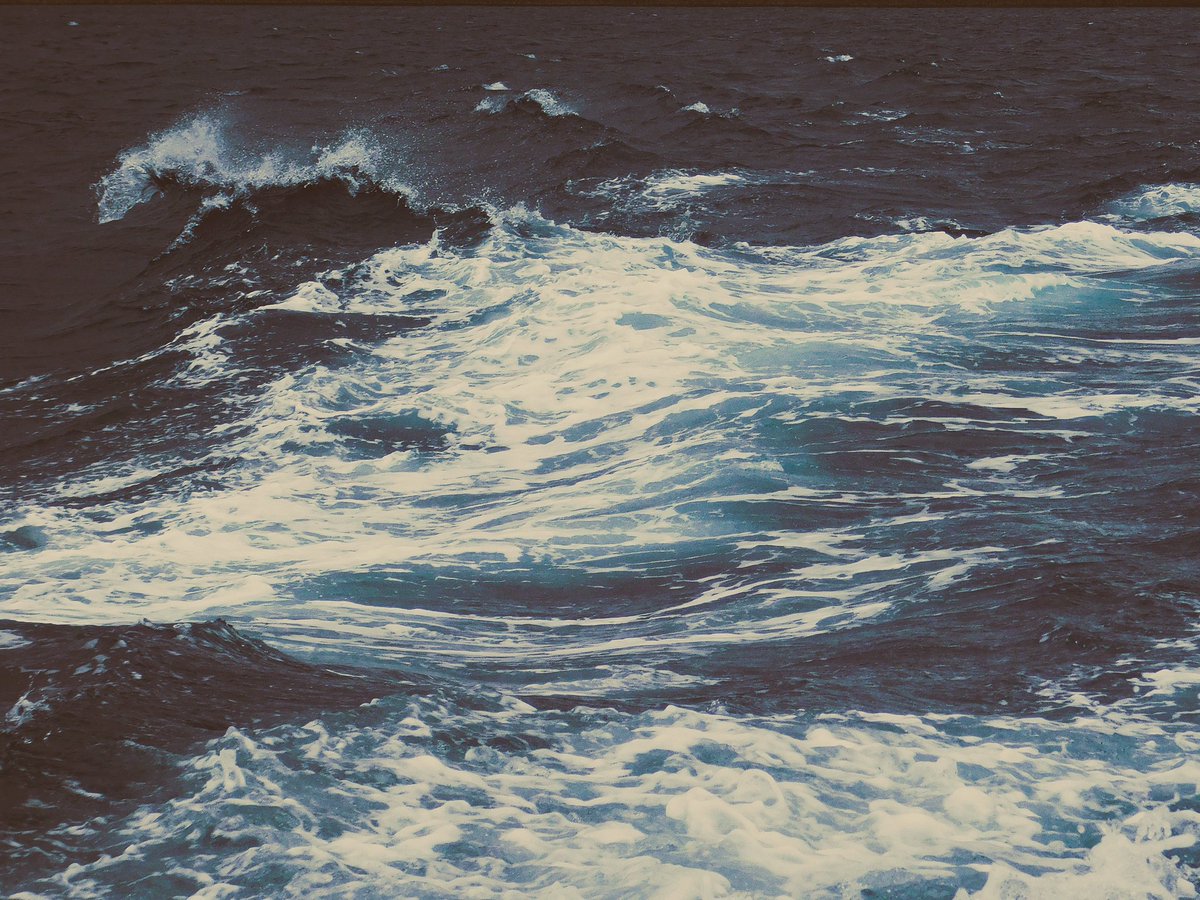 vivrelamer's tweet image. it felt like a cold day. the rain falling softly as i stood in this boat, mesmerized by the dancing waves