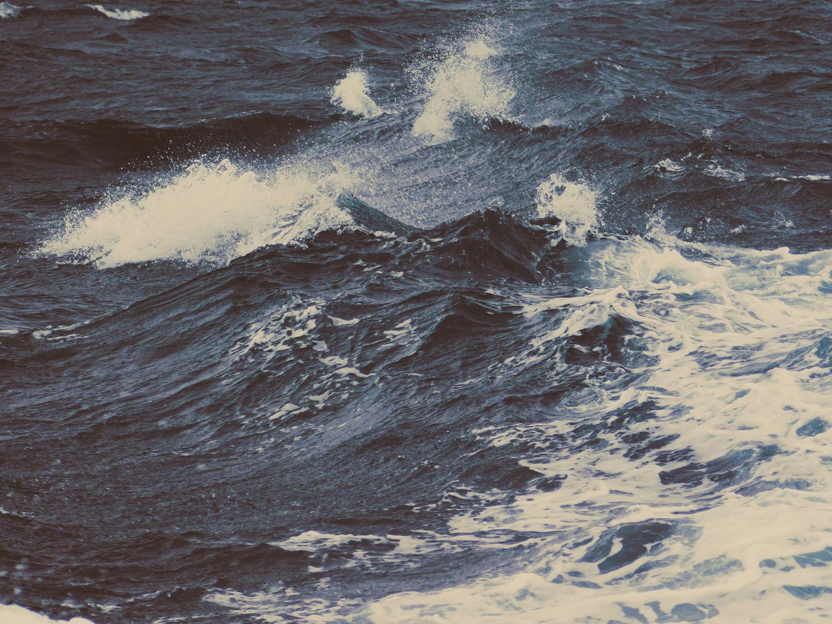 vivrelamer's tweet image. it felt like a cold day. the rain falling softly as i stood in this boat, mesmerized by the dancing waves