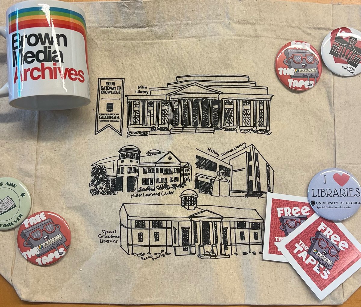 hargrettlibrary's tweet image. We love Media's Free The Tapes Guy so much, we got him in every format: buttons, stickers, magnets galore! There just might be another version of him for Bingo winners only👀There’s only one way to find out! Join us this Saturday at 1pm for “Free the Tapes: Summer Edition”