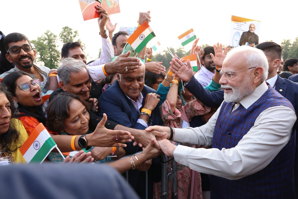 narendramodi's tweet image. Touched by the warm welcome from the Indian community in the UK. Their affection and passion towards India’s progress is truly heartening.