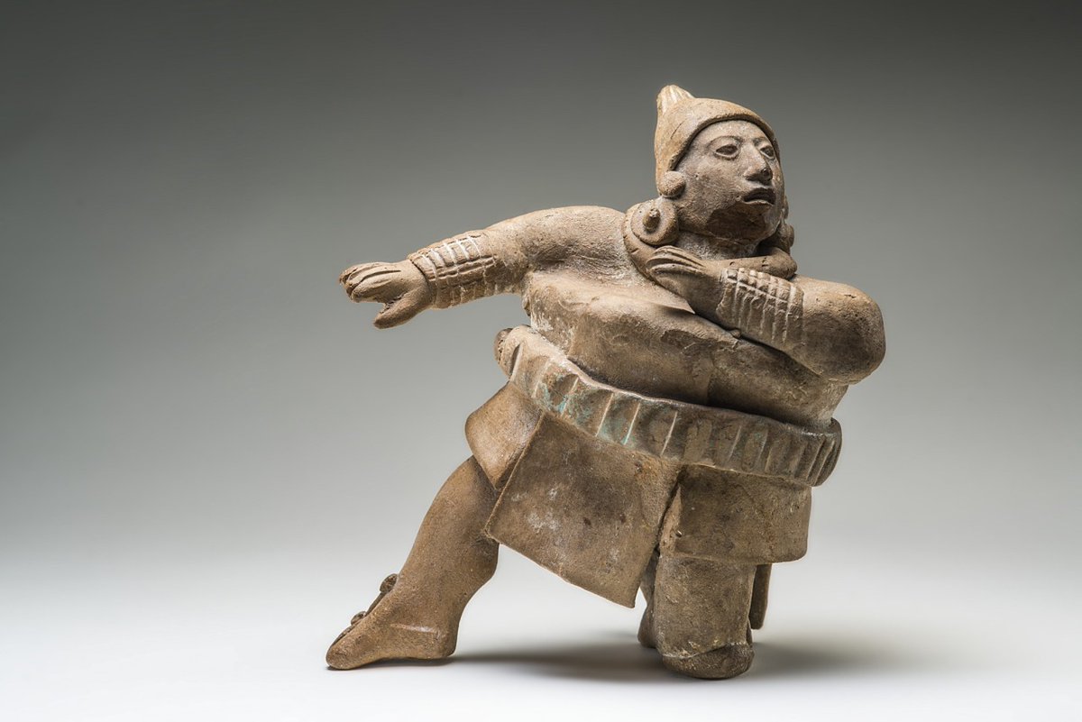 Ceramic figure depicting a ball player in action, from the Jaina culture, Late Classic period (600-800 AD). Collection: Museo Nacional de Antropología, Mexico.