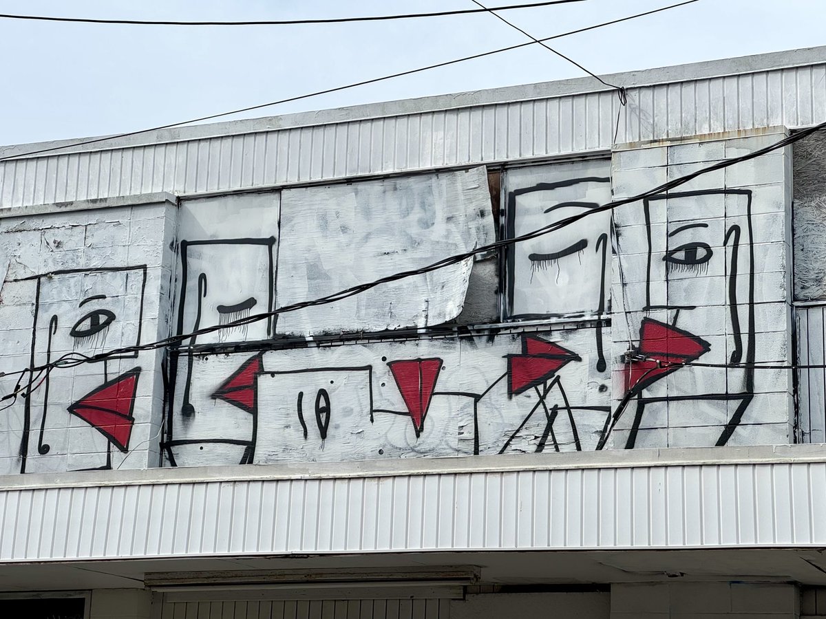 Really unique graffiti on the old Drop-In Center.