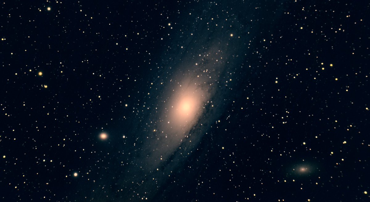 My first higher effort astrophoto (M31 - Andromeda Galaxy - ~1.5 hours). Lots of mistakes that I will try to avoid next time.