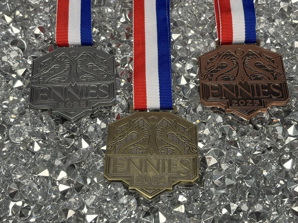 ENNIE Awards (@ennies) on Twitter photo The ENNIES are again honored to receive the 2025 medals from our sponsor <a href="/CampaignCoins/">Campaign Coins</a>. These beauties will be handed out on Friday August 1st at Gen Con! The ENNIES are again honored to receive the 2025 medals from our sponsor <a href="/CampaignCoins/">Campaign Coins</a>. These beauties will be handed out on Friday August 1st at Gen Con!