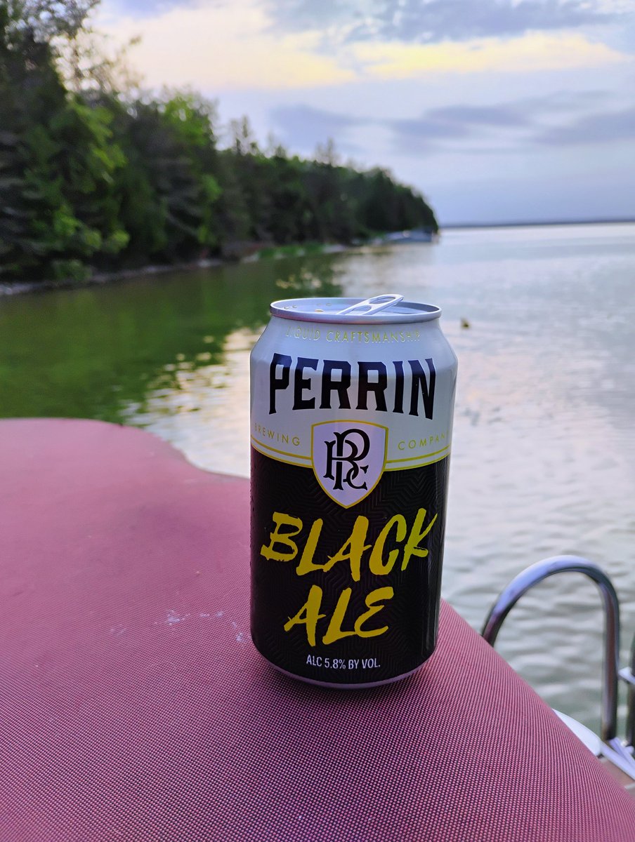 BeerSnobSean's tweet image. The clouds are blocking a sunset view tonight on Mullet Lake. Looks like rain in a couple of hours but I'll be drinking as much #mibeer as possible til then. @PerrinBrewing 5.8% black ale satisfies my dark side after lots of "summer beers". @thestation310 @RustedSpoke @bieredemac