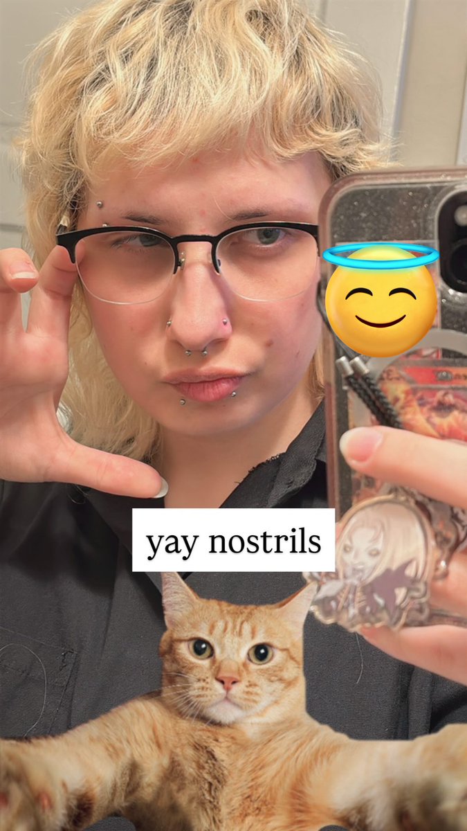 shakemytomb's tweet photo. super unflattering post-work photo but my piercings finally match all my self inserts LOL https://t.co/aZVtuh2WJQ
