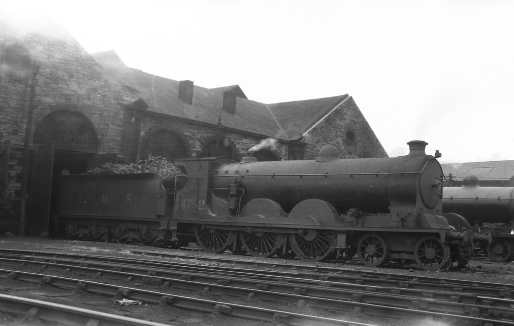 adipullenLNER's tweet image. Ex-Caledonian Railway 903 Class No. 14752 (CR No. 903 &apos;Cardean&apos;) at unknown location &amp;amp; date. Seen here a shadow of her former glory in LMS Lined Black livery with a former CR 4-4-0 to the right of the locomotive.

📸Neville Stead Collection