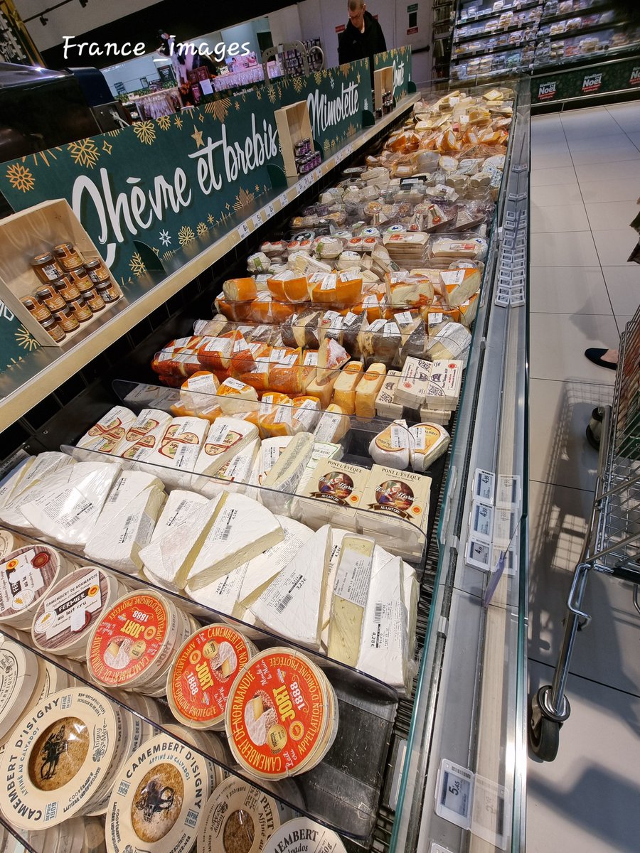 A selection of cheeses in a French supermarket 

 France 🇨🇵 travel photo