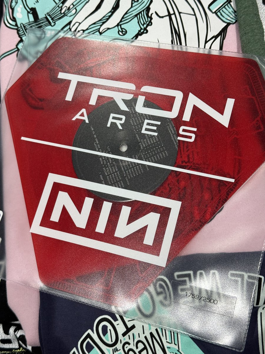 It was a complete surprise at Comic Con to see a TRON ARES booth that sold an exclusive Nine Inch Nails vinyl- this wasn’t announced ahead of time as far as I know so it was funny seeing the booth have zero line for hours and then suddenly the longest line ever