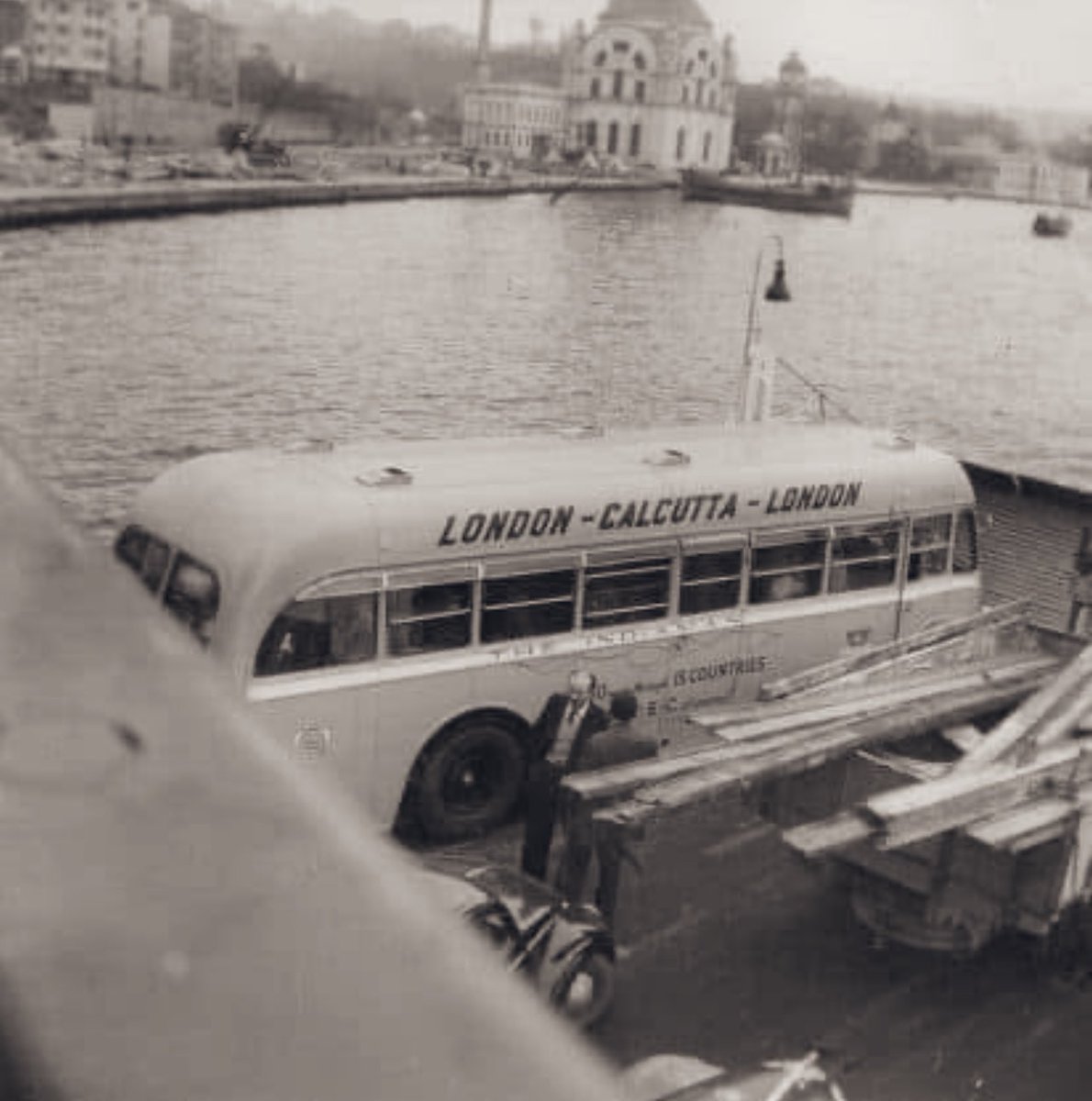 SantanuB01's tweet image. The London-Calcutta-London bus on a ship in Istanbul, #Turkey—Dolmabahçe Mosque in the background, 13 May 1957. From 1957 to 1976, this iconic 10,000-mile journey—known as the “Hippie Trail”—connected #London to #Calcutta, passing through 11 countries over 50 days. The luxurious…