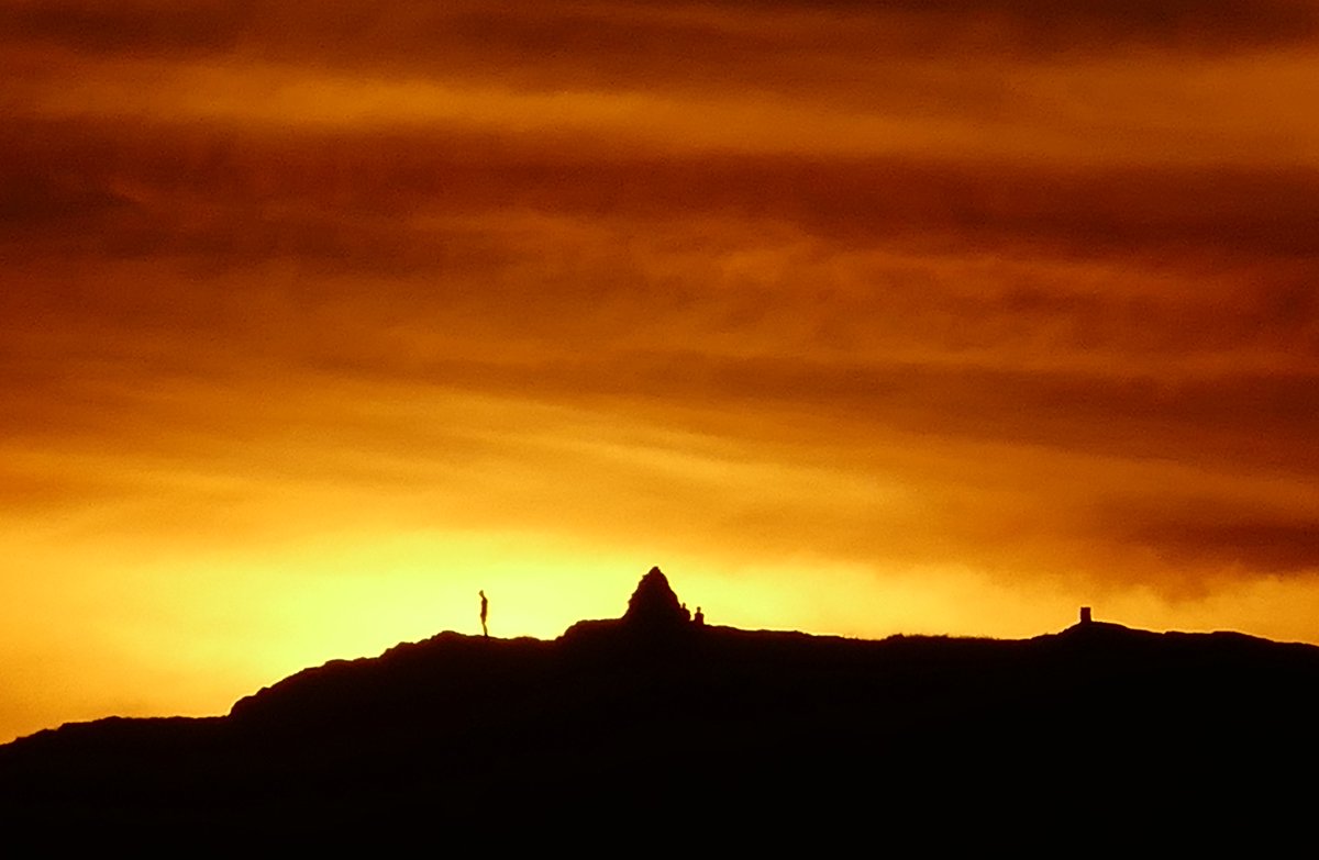 EdgeofMull's tweet image. Figures on Dun I, Iona as the sun set. Taken from across the water on the Isle of Mull.