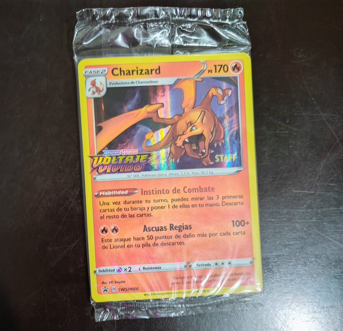 frixburn's tweet image. Would it be worth grading this Charizard PROMO STAFF from the Sword and Shield era?
And if so, what grade do you think it would get?

@dripshop_live
@Jihoz_Axie 
@Hantao