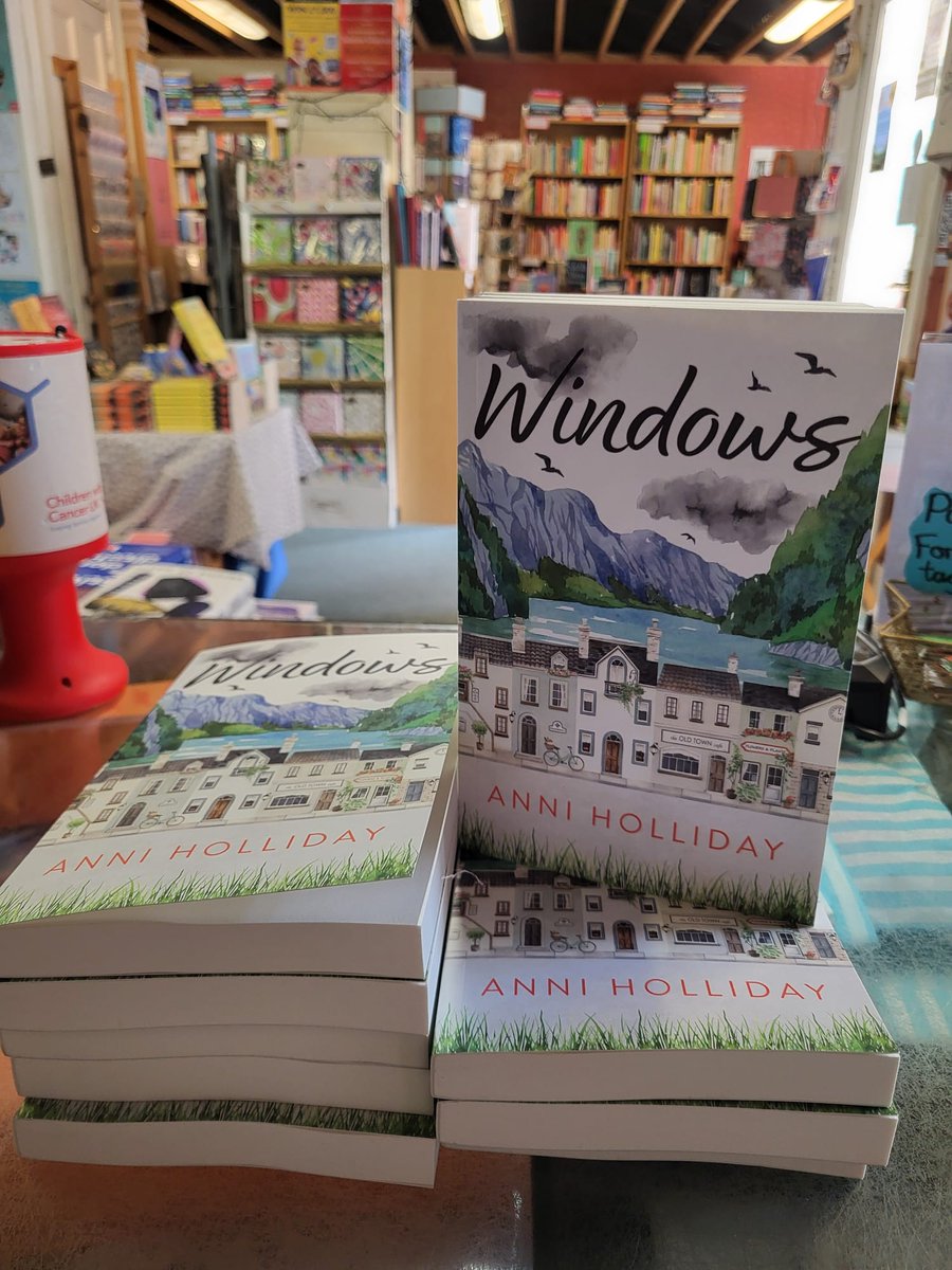 Furtherfrom's tweet image. Lovely to have local author Anni Holliday in to sign copies of her debut novel, Windows! The book is loosely based on Linlithgow High Street: will you spot yourself in it we wonder?!
Signed stock now in store, and in our own Window! #ChooseBookshops