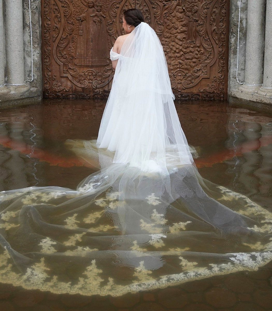A Filipino couple got married in a flooded church after it was hit by a typhoon