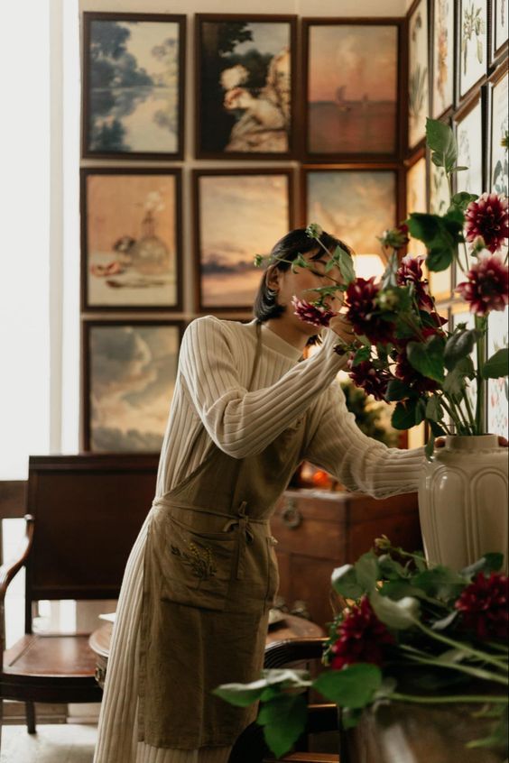 Gen_Boiko's tweet image. Soft light streams in a gallery,
Where brushstrokes weave tranquility,
Fragrant scents captivate,
Crimson blooms drenched in velvet wine,
Stems and petals dance in a vase,
Creative souls navigate the day.
Eve, (GB)
Photo:
A.C.
Unsplash