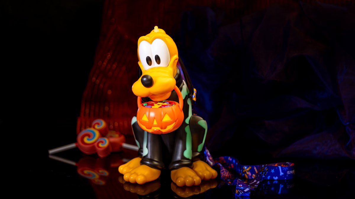 ScottGustin's tweet photo. Disneyland shared photos of several Halloween items in its foodie guide including the Pluto Skeleton Sipper, Cars Land Lighted Cone Sipper, Mickey Mouse Ghost Bucket, and the Jack Skellington Gravestone Bucket. https://t.co/S0fgd9UmGw