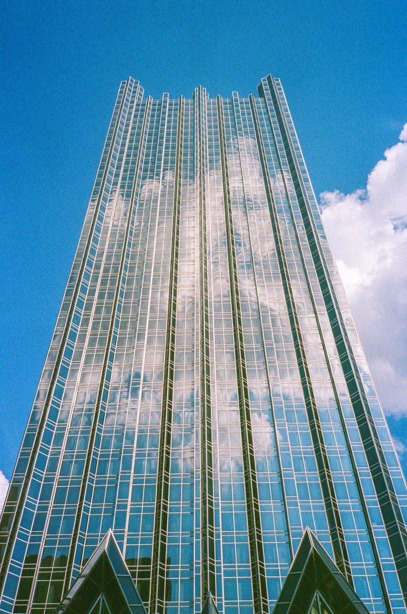 Always wanted to capture a view like this, and figures it would be on film when I finally did. Last week it looked like PPG Place in #Pittsburgh was just a big window, with clouds appearing to just continue from the sky behind the building giving the image a surreal look.