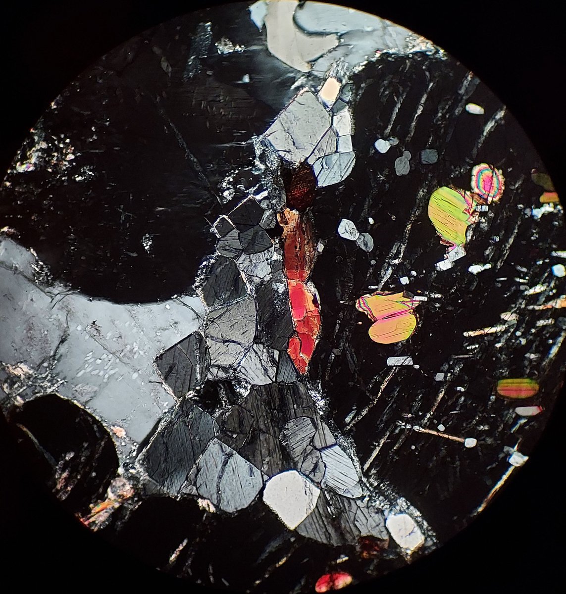 Mineralogical Society of America (@minsocam) on Twitter photo Sillimanite; rutile; garnet; biotite; and somewhat altered plagioclase.  XP: garnet is black, sillimanite is gray, and feldspar shows some exsolution. Contributed by Matt Kohn.  You can contribute: Send images & short caption to akoziol1 at udayton dot edu.  #thinsectionthursday Sillimanite; rutile; garnet; biotite; and somewhat altered plagioclase.  XP: garnet is black, sillimanite is gray, and feldspar shows some exsolution. Contributed by Matt Kohn.  You can contribute: Send images & short caption to akoziol1 at udayton dot edu.  #thinsectionthursday