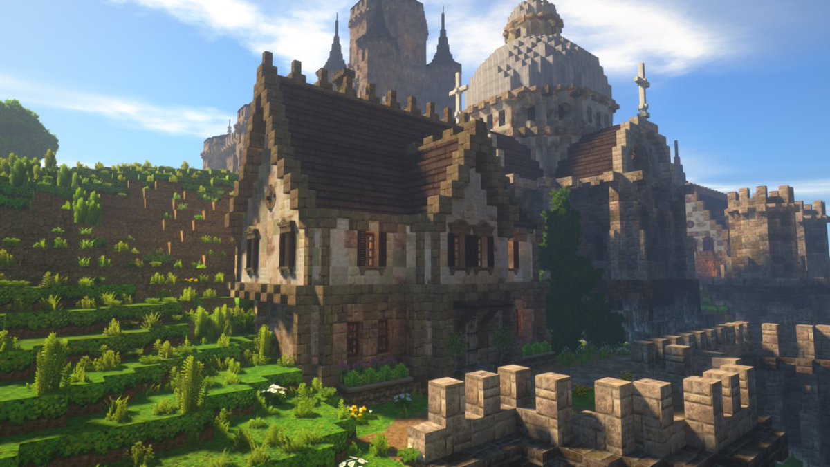 justinia_mc's tweet image. 教会の裏手に司祭館を作りました
目の前の谷の崖には城壁が張ってあり、谷底から町への侵入を防いでいます
この町は無骨な城塞として、今までの町より花や花壇に頼らない味付けを狙っているのですが、花が無いとちょっと寂しい
#Minecraft
#MiniaTuria