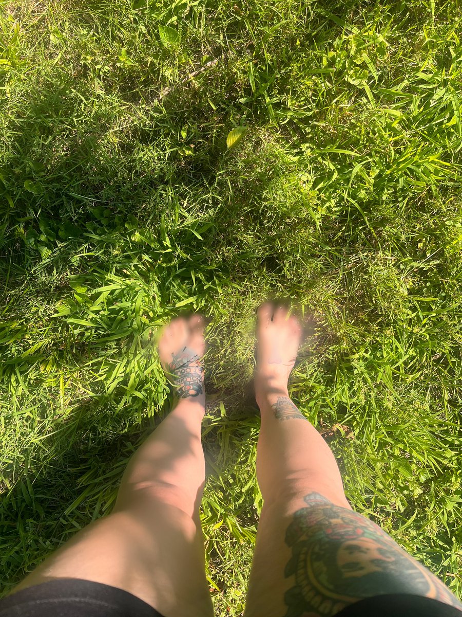 ambergoesoff's tweet image. it’s that time when the summer grass is perfect for grounding…
feet redacted for legal reasons.