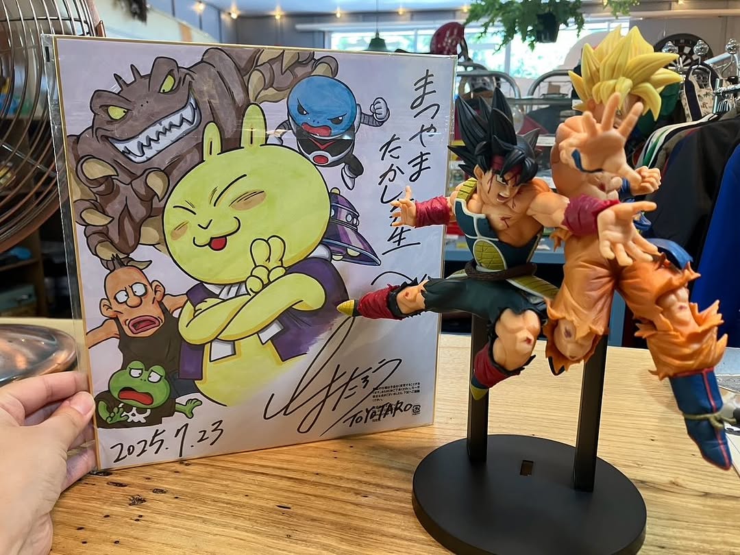 Toyotaro le dio un shikishi de Oishii Shima no Ūh-sama, un manga corto hecho por Toriyama para el folleto BIOSPHERE en 2009(?), que forma parte de un proyecto ambiental en Japón.

Es la primera y única obra en la que Matsuyama actuó como asistente de Toriyama desde el final de DB