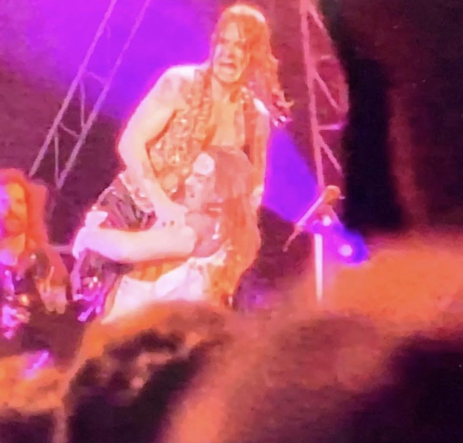 One of my life long friends carrying Ozzy across the stage at the Fox theater in Detroit in 91. When he put Ozzy down Ozzy kissed him on the forehead and helped him passed security.