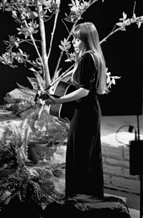 joniarchive's tweet image. joni mitchell on the very first episode of the johnny cash show, performing both sides now, 1969