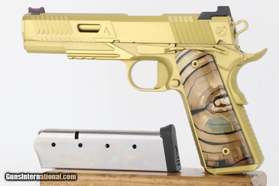 GunsInternation's tweet image. Take a look at this Gorgeous, Gold Nighthawk Custom 1911 Agent 2 - Mammoth Ivory Grips here - tinyurl.com/3drrx5a8
Let us know what you think!
#Gunsinternational #guns #firearms #tactical #pew #NRA #GOA