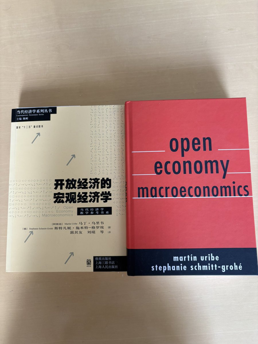 Delighted to have received a hard copy of the translation our Our Open Economy Macroeconomics textbook
