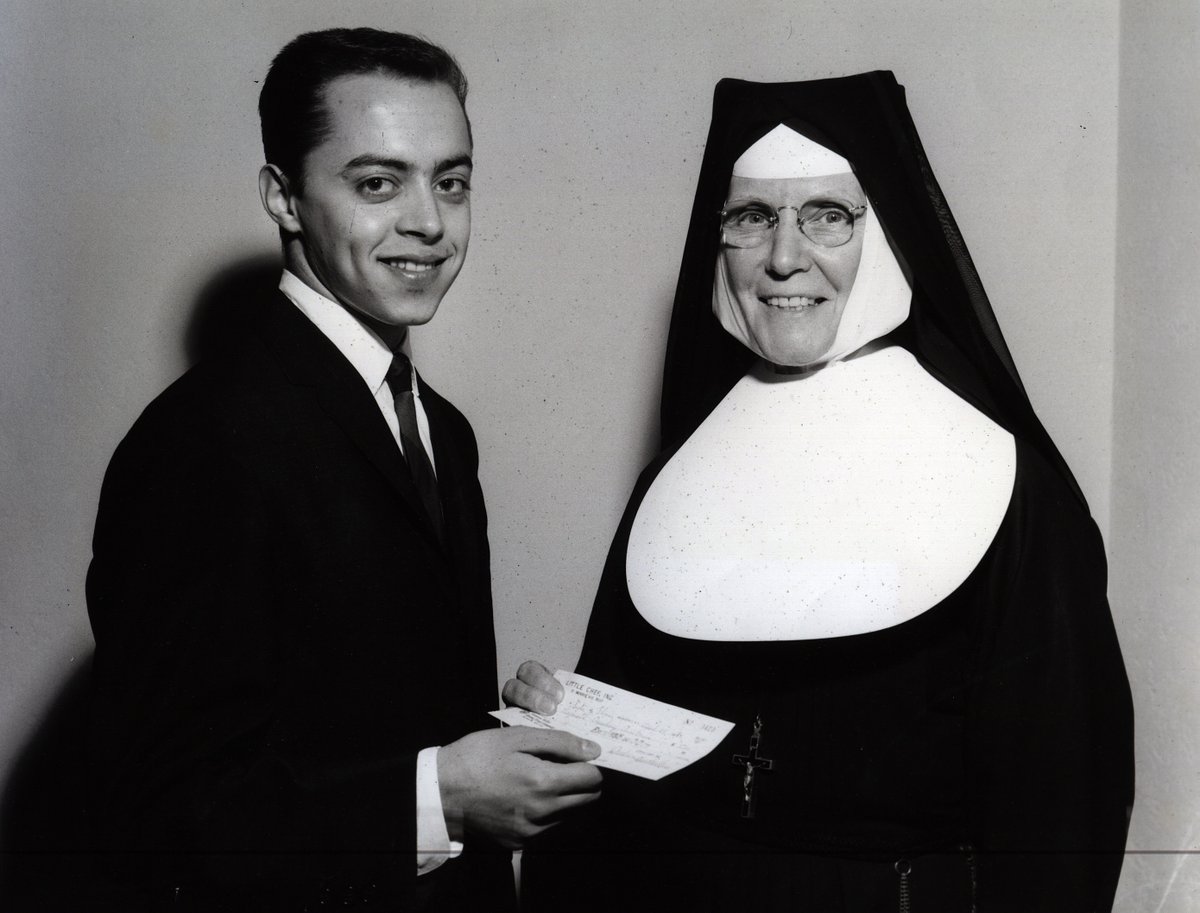 In loving memory of #ChuckMangione: Here's a 1964 photo of him presenting Sr. Florian Reichert (SSJ music supervisor) with $900 from a benefit concert he organized for our instrumental music program. His generosity &amp; passion for music education will always inspire. #FeelsSoGood