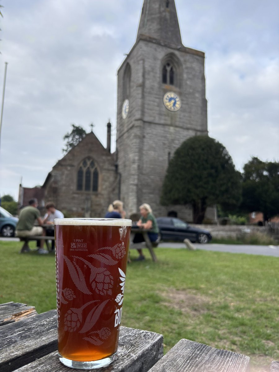 mometfisher's tweet image. Gazing at a church, with a pint from the pub, in a lovely village green. England 🏴
