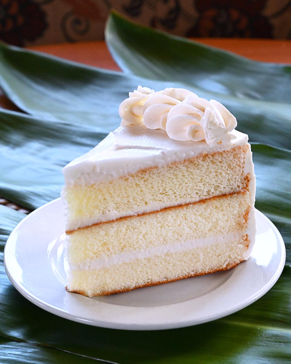 KH_bakery's tweet photo. This perfect Haupia Cake sets the bar for coconut lovers everywhere! Especially for it's supremely moist with a soft fluffy vanilla chiffon cake filled &amp; topped with whipped cream &amp; coconut haupia pudding. Aloha in Every Bite® Hele on over to taste one of our fan favorites. 🍰 https://t.co/tjqnh3aV6M