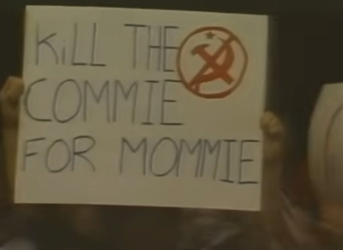 From a 1986 Dr Death music video. <a href="/JYDbook/">Greg Klein</a>