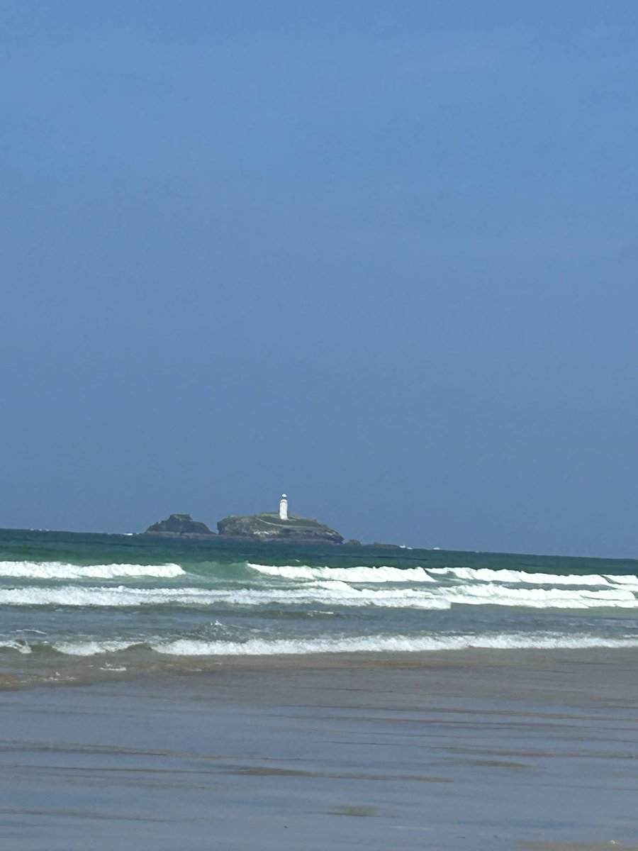 The wonderful view from our apartments in Cornwall. Then some images of Godreevy Lighthouse which is the other end of St Ives bay. We got back to our beach just as tide was cutting us off.