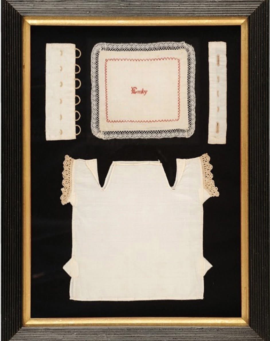 These late 19th-century miniature workbook sewing samples demonstrating various techniques and stitches were sewn by a girl named Emily. She perhaps worked these pieces at an orphan or charity school and tucked them into the blank pages of her instruction book