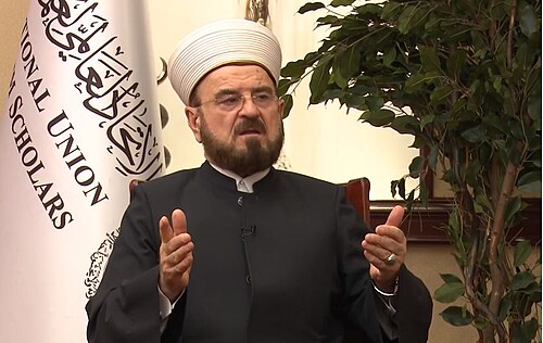 فتوای اسلام استخباراتی :

علی قره‌داغی - رییس به اصطلاح دانشمندان اسلامی - در واقع  ملایی از کردستان عراق مستقر در دوحه که  برای دستگاه اطلاعاتی قطر کار می‌کند خواستار رسمیت شناسی طالبان شده است. 

 قطر، که در رقابتی گاه پنهان و گاه آشکار با عربستان سعودی قرار دارد، می‌خواهد این