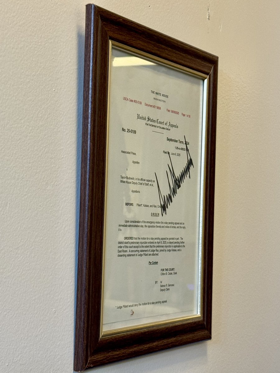 PenguinSix's tweet image. The White House has added a @potus signed copy of the court decision allowing the barring the Associated Press from the press pool to the walls of the White House press gallery.