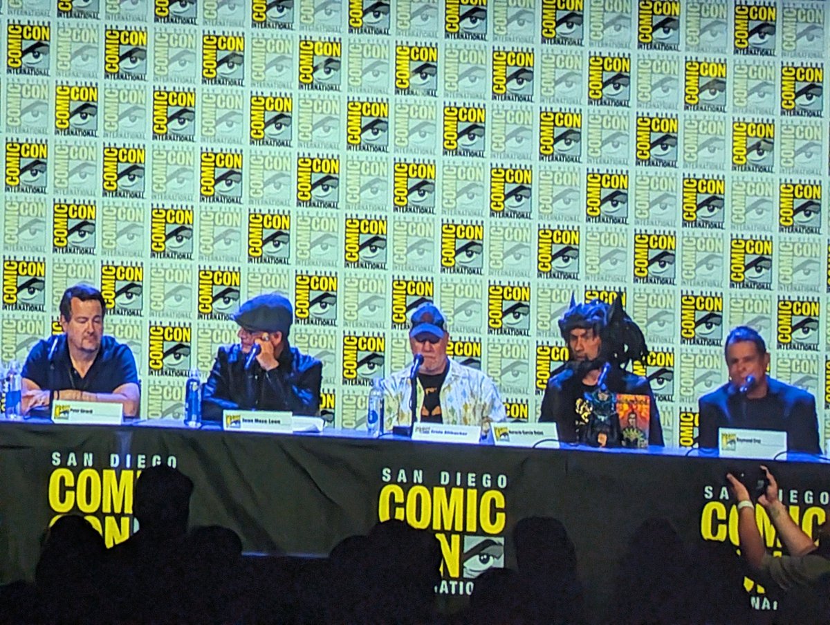 BatmanUniverse's tweet image. Horacio Garcia Rojas (the voice of Batman) is attending the panel in full Batman Azteca headgear. Looks awesome.