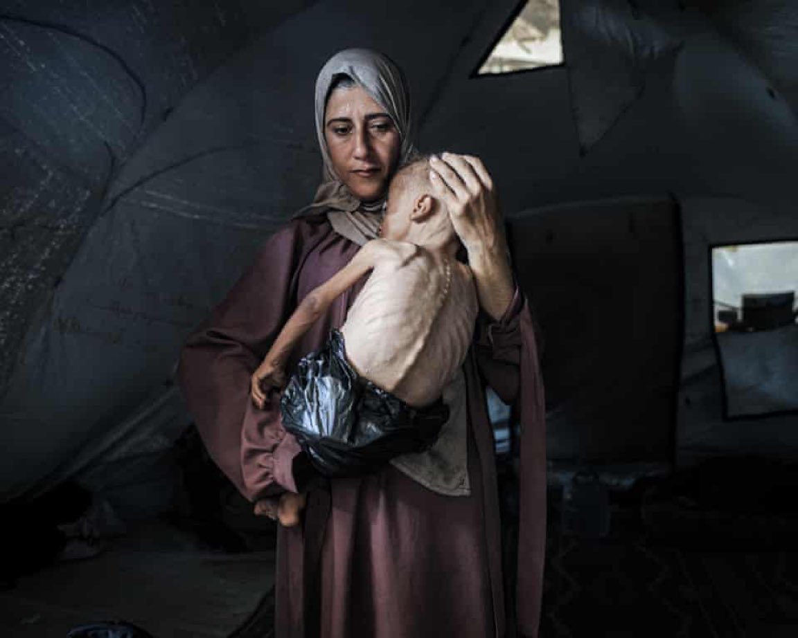 woolfe's tweet image. Gazan starves her child for publicity. Lovely people