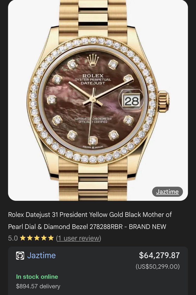 #NAYEON seems to be wearing a rare Rolex Datejust 31 Ref. 278288RBR, 31mm | 18k Yellow Gold | Diamond Bezel | President Bracelet | Brown Dial. 

Due to the rarity of Nayeon’s watch, it estimates at around 50,000-54,000 USD, depending on if the hour markers are diamonds.