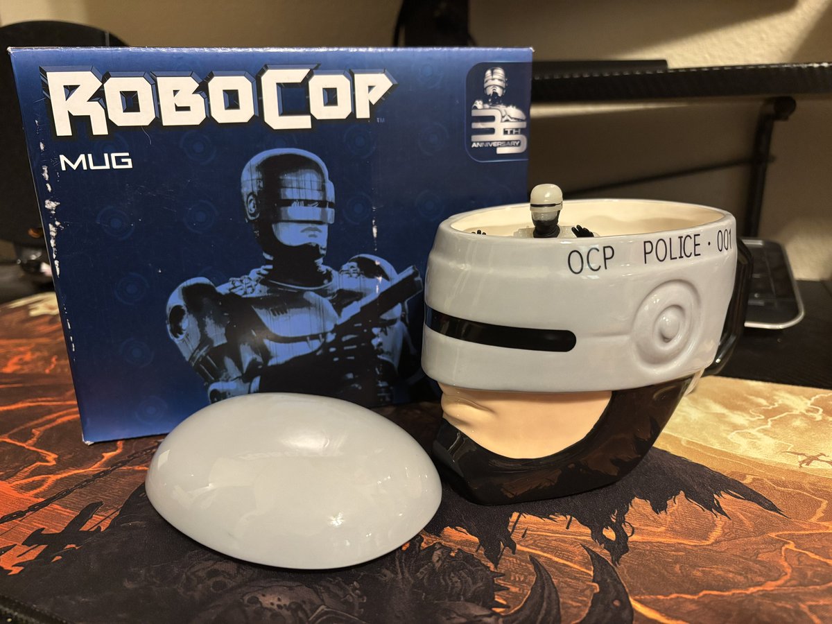 Crimson_Godot's tweet image. I’m always a fan of silly mugs so here’s another for the collection! The Robocop 35th anniversary mug