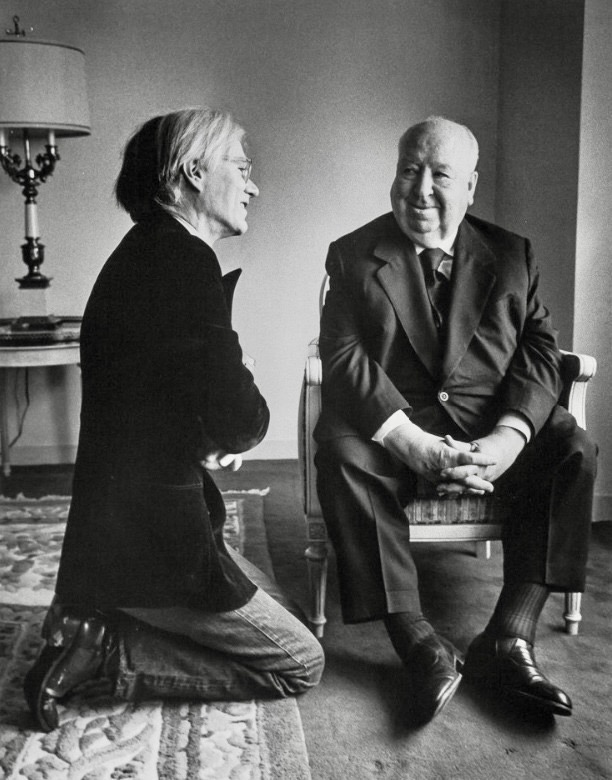 baileymarkham's tweet image. GM! Andy Warhol paying homage to Alfred Hitchcock. Photograph by Jill Krementz on April 26, 1974, at the Sherry Netherlands Hotel in NYC. Hitchcock was in New York for a salute from the Lincoln Center Film Society, and Warhol conducted an interview with him during this visit.…
