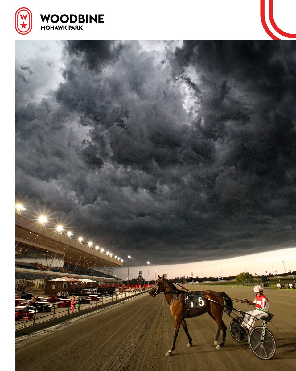 Dramatic clouds rolled into the Woodbine Mohawk Park winners circle on Thursday to greet the race 4 winner, Meadowview Rothy, driven by Mario Baillargeon and trained by Mark Etsell.
