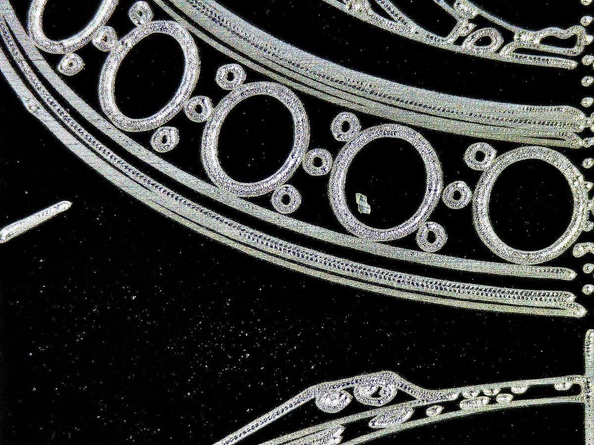 close ups of some lasered anodized aluminum
