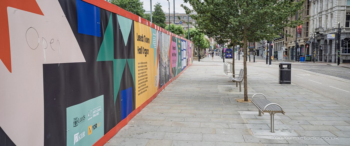 Black and white or colour? It's the age-old question in street photography. Black and white is great for focusing on shapes, textures, and shadows. It can feel more timeless. Colour, on the other hand, can add to the story. A red coat, a yellow taxi... sometimes colour *is* the