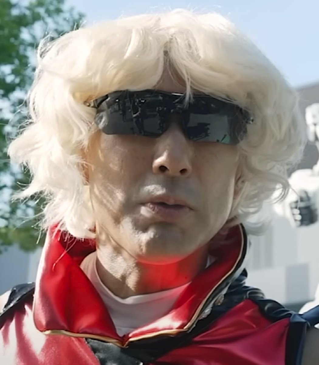 Dexerto's tweet image. A Japanese politician is facing backlash for cosplaying as Gundam’s Char Aznable to promote his election campaign